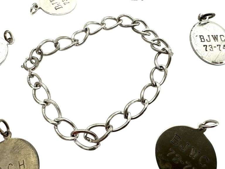 Sterling Silver Charm Bracelet - 22.80 grams