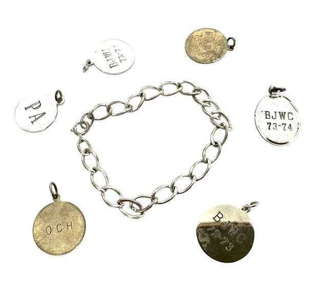 Sterling Silver Charm Bracelet - 22.80 grams
