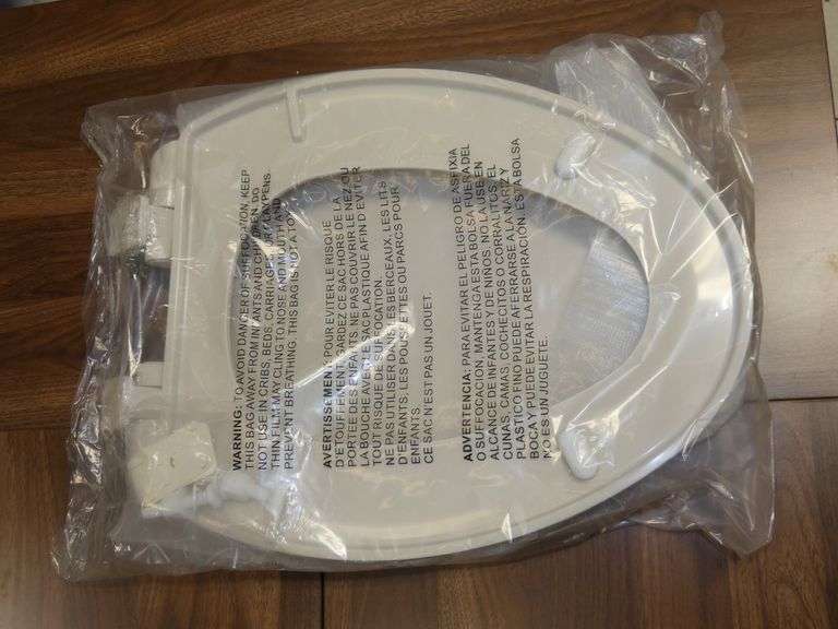 New 2420 18" Elongated Toilet Seat in Biscuit Color