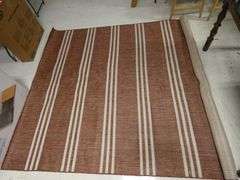 7ft x 10ft Rust Red & White Rug