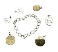 Sterling Silver Charm Bracelet - 22.80 grams