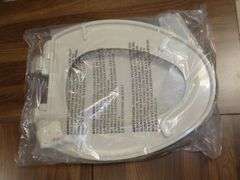 New 2420 18" Elongated Toilet Seat in Biscuit Color