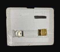 U.S. Navy Zippo Lighter and Belt Buckle Assortment